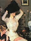 Lady Trying On a Hat by Frank Weston Benson